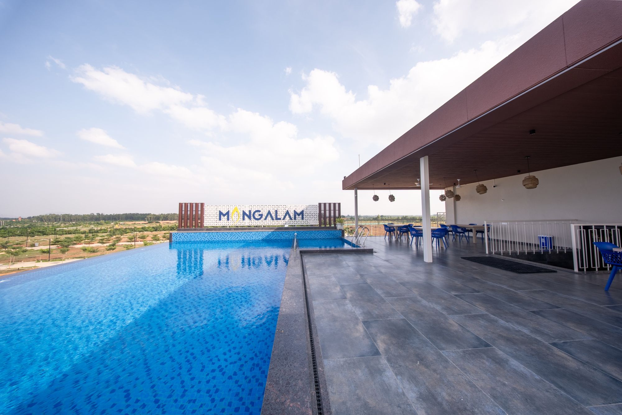 Pool terrace at the Auraville clubhouse, actual photograph
